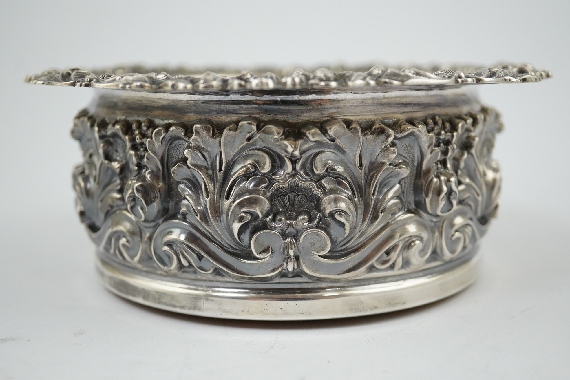 A George IV silver mounted wine coaster, by John & Thomas Settle